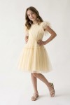 Side profile of Paola buttercup tulle dress with flared skirt