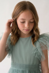 Feather-trimmed sleeve close-up on the Paola mint tulle dress