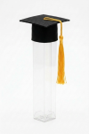 Close-up of miniature black graduation mortarboard cap