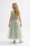 Bella sage green party dress styled for weddings and celebrations