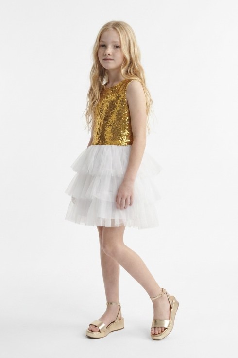 Riva girls' white and gold party dress with a gold sequin top and layered white tulle skirt – full-length front view