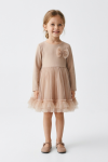 Iga beige dress with long sleeves and tulle bow – full-length front view