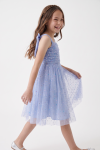 Rina girls' light cornflower blue party dress in tulle with coloured sequins – girl in motion, side view