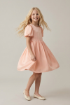 Sia pink dress – twirling, flared skirt in motion, studio shot