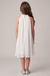 Rozalia white pleated dress – back view, pearl collar fastened with a button