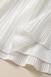 Rozalia white dress – detail of the pleated skirt and smooth lining