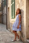 Harper girls' light blue sleeveless dress styled outdoors – full length