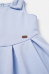 Harper light blue dress – detail of a shoulder bow and the pleats at the waist