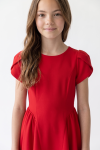 Rumi red dress – top with tulip sleeves and round neckline, front view
