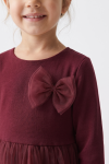 Iga burgundy tulle dress – detail of the bow and round neckline