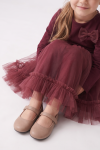 Iga girls' burgundy dress – tulle skirt spread out, seated pose