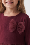 Iga burgundy dress – close-up of the double tulle bow on the knit