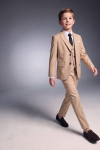 Liam beige boys' set – blazer, waistcoat, trousers and black tie, in motion, front view