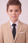 Liam beige boys' set – blazer lapels and black tie, close-up from the chest up