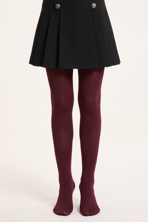 Girls' burgundy opaque tights, plain – on a model, front view