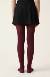 Girls' burgundy opaque tights – on a model, back view