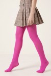 Girls' fuchsia opaque tights – on a model mid-step with a pleated check skirt, side view