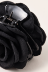 Black fabric rose claw clip – close-up of the spring and the petal texture
